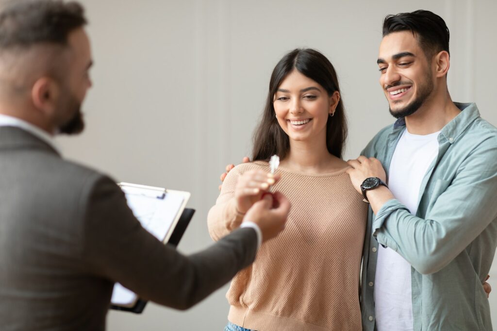 Real Estate Agent Giving Keys to Tenant